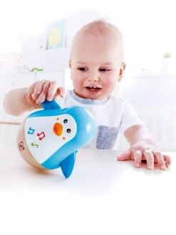 Pingouin Culbuto Musical HAPE Bleu - Hape -Magasin De Jouets pingouin culbuto musical hape 1