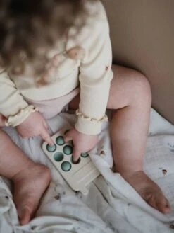 Pop-it Téléphone - MUSHIE Rose - Mushie -Magasin De Jouets pop it telephone mushie 2